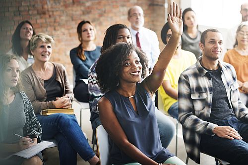 Parents in a class learning effective ways to communicate with their children and/or teens in a respectful positive way.